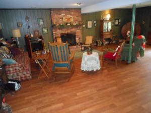 FAMILY ROOM WITH WOOD BURNING FIREPLACE