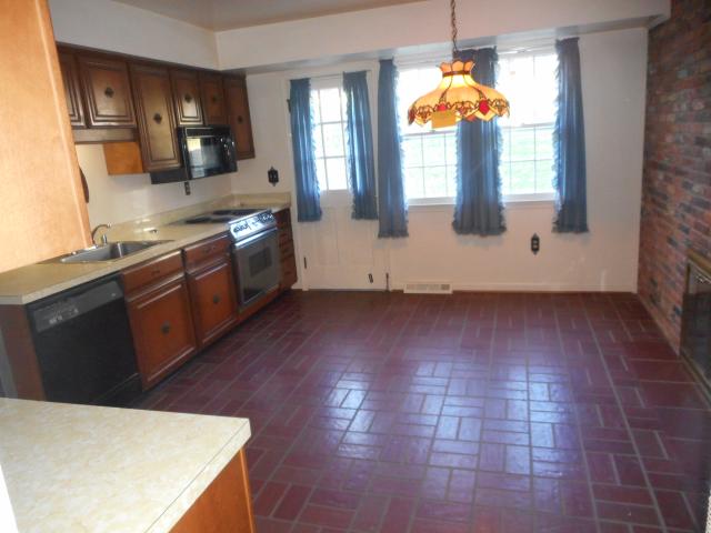 Kitchen With Patio And Yard Access