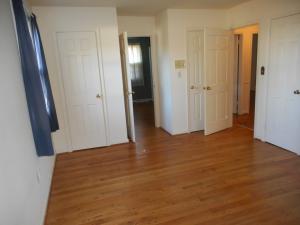 Master Bedroom With Hardwood Floors