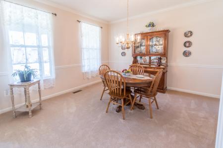 Dining Room With Chair And Crown Moulding