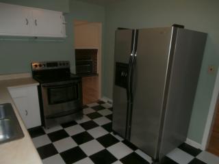 Kitchen With Stainless Steel Refrigerator