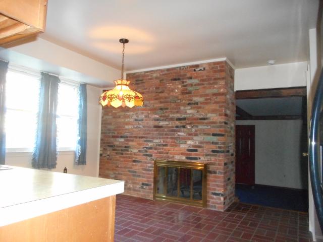 Two Sided Fireplace In Kitchen