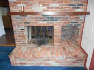 Brick Hearth Fireplace In Family Room (2 Sided)