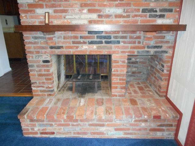 Brick Hearth Fireplace In Family Room (2 Sided)